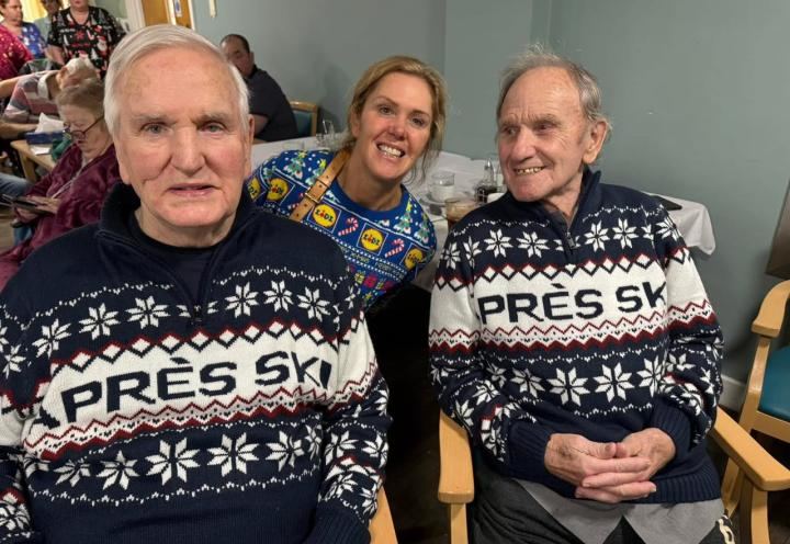 William and John wearing their Christmas jumpers together