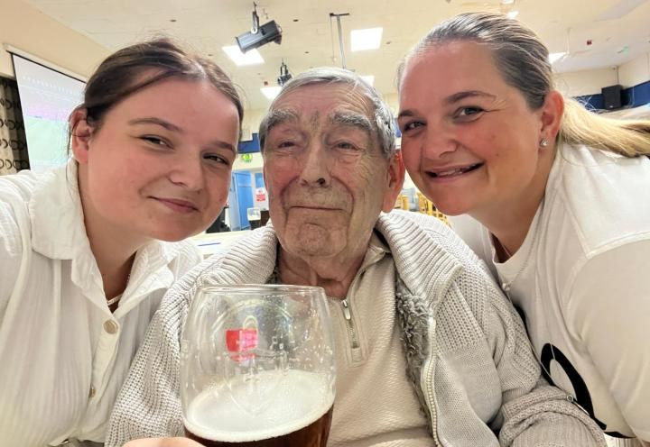 photo of 3 people smiling