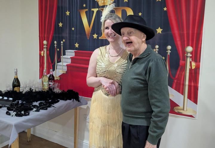 Photo of resident Bill with singer Poppy Holiday