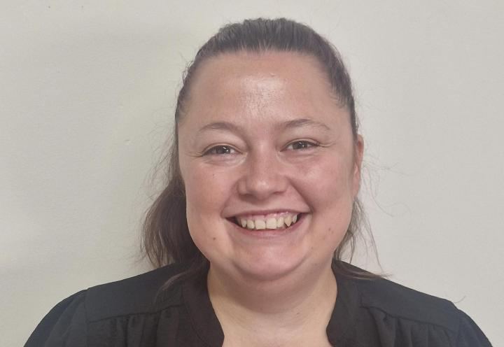 Smiling headshot of Lisa-Marie