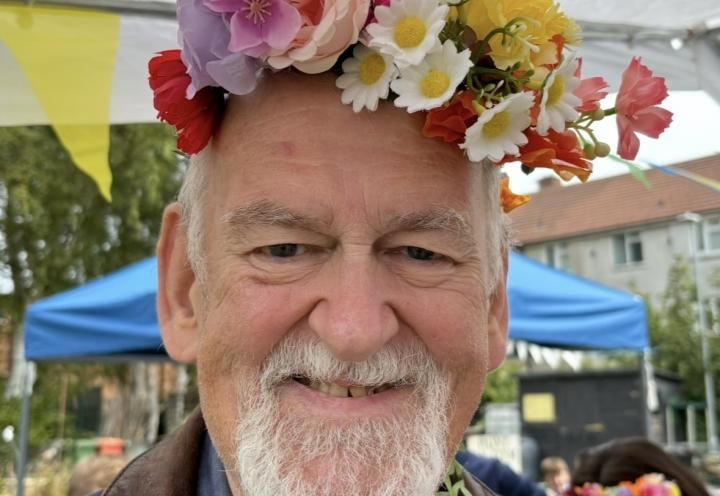 Photo of Michael wearing flower crown
