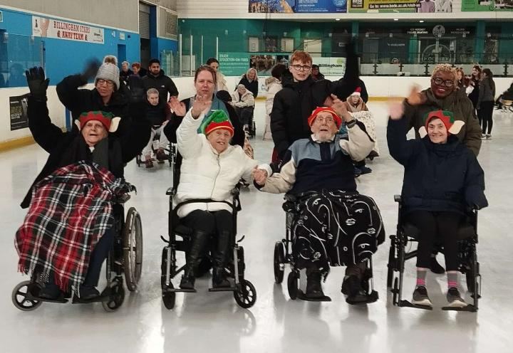 Residents and team members on the ice